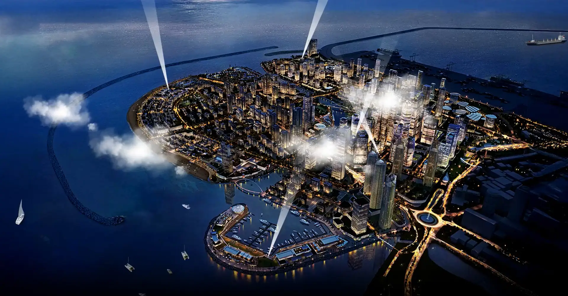 Overhead view of Port City, a modern coastal development featuring skyscrapers, green spaces, and a surrounding harbor.